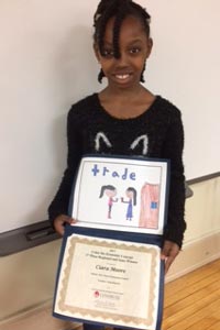 Ciara with her poster and certificate