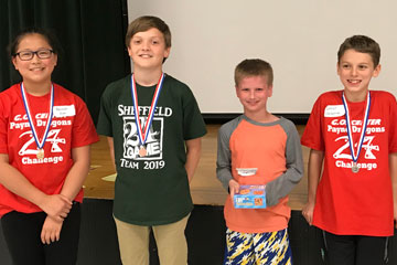 Students wearing top place medals