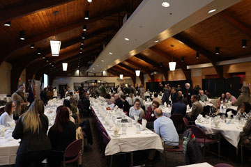 Large dining room with people mingling