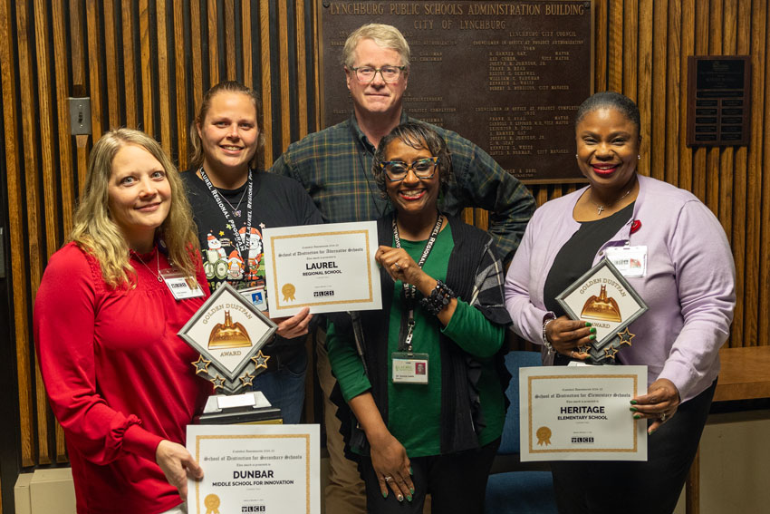 Director of Facilities with winners of Fall 2024 Golden Dustpan Awards