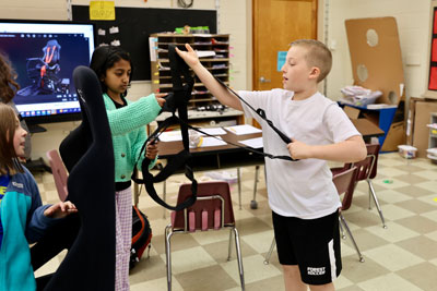 Students working on eVRplay equipment