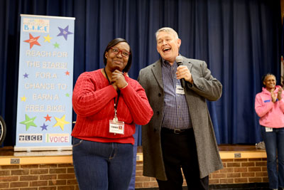 Dr. Copeland speaking next to Ayanna Stamps-Glover during Teacher of the Year presentation