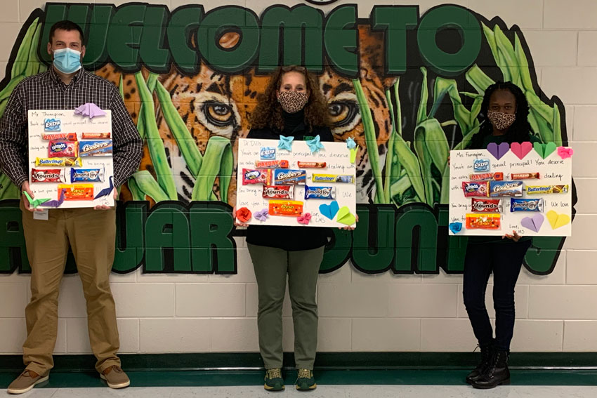 3 principals holding appreciation gifts