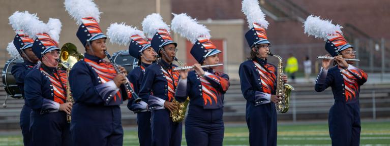 Marching band performing on field